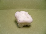 WhiteMint Fluffer: A peppermint marshmallow covered in white chocolate and sprinkled with white nonpareils.